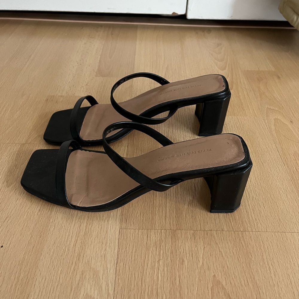 Black heeled mules